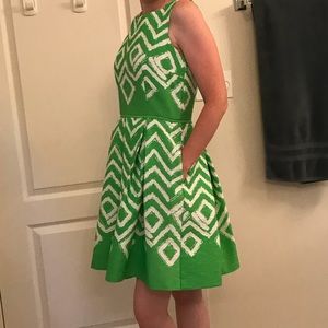 Green and white sleeveless dress